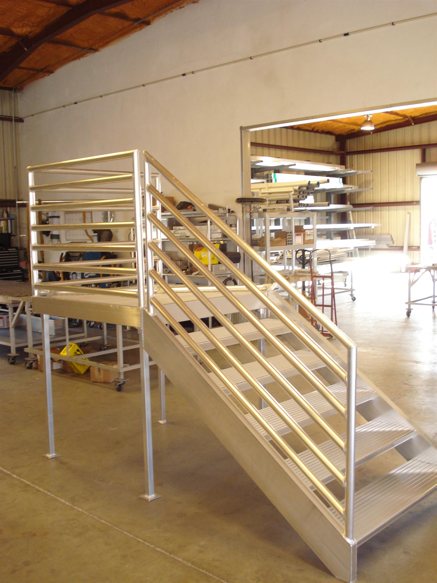 aluminum stairs with raised platform