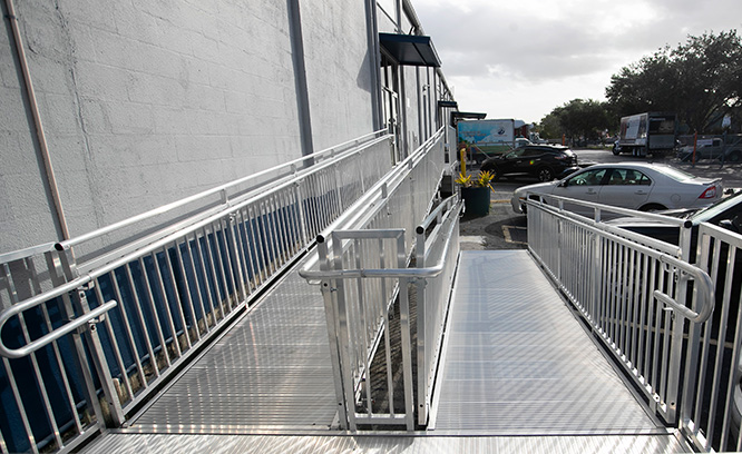 Dual level ramp system outside building